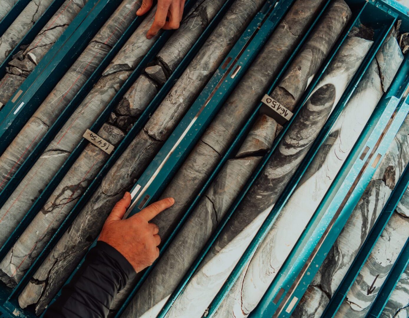 A team of geologists analyse the core samples from a geological survey
